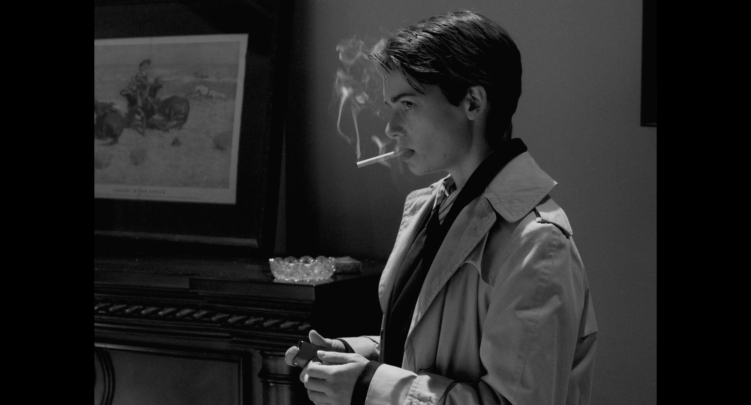 Butch Still 1 Butch looking angrily offscreen while they smoke a cigarette.