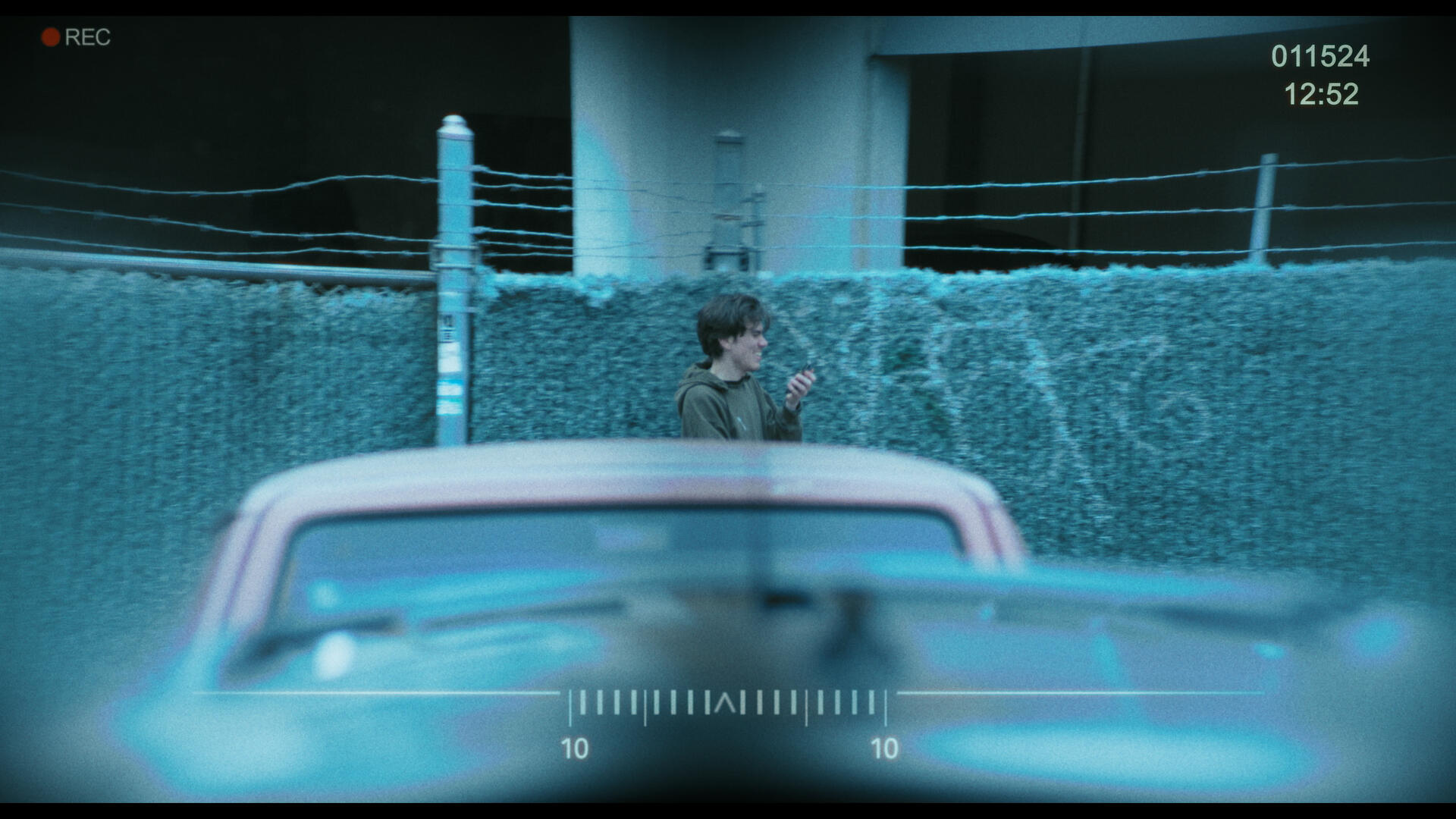 The antagonist of Working for the Weekend, as viewed through a set of binoculars across from across the street.